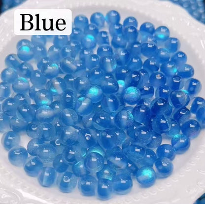 FS6034- 10Mm Optically Variable Glow-In-The-Dark Resin Beads