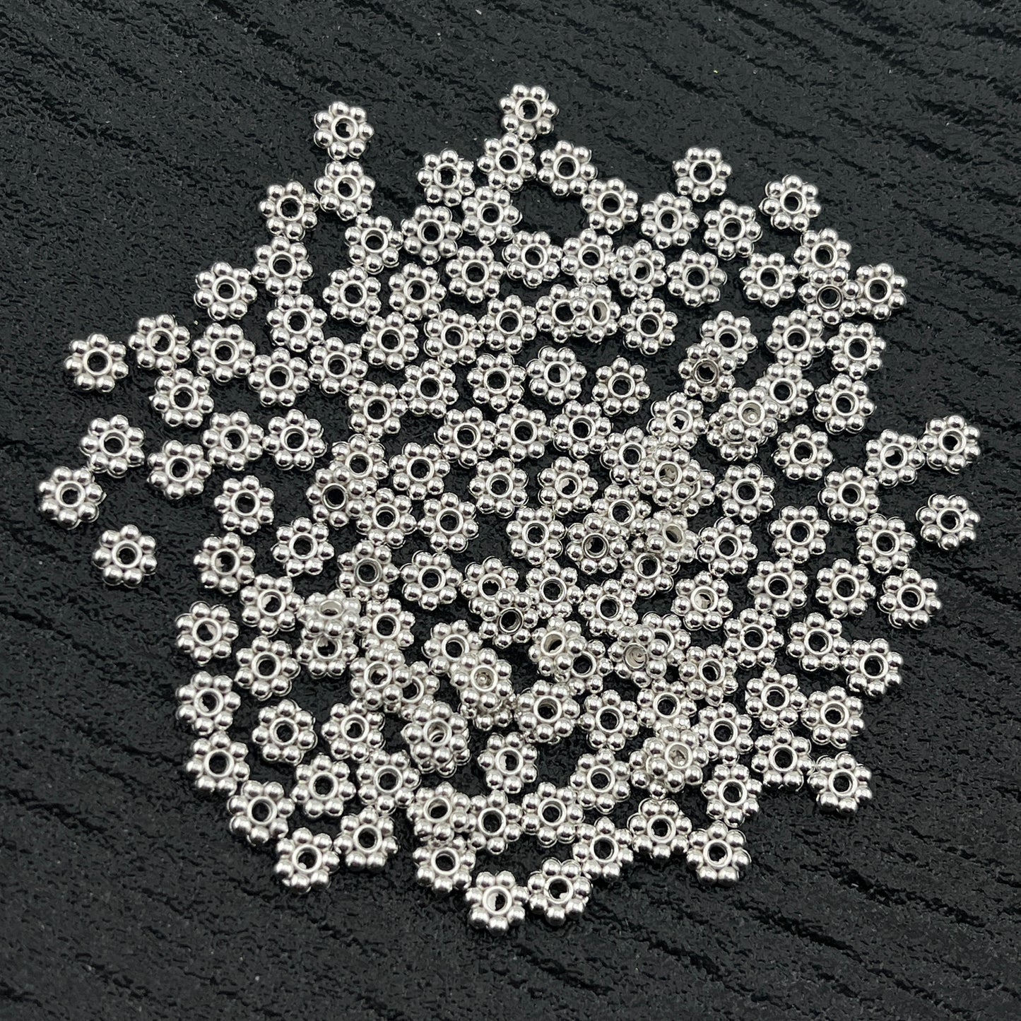 FS2506- 5mm Metal 7 Point Flower Spacers