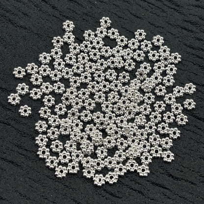 FS2506- 5mm Metal 7 Point Flower Spacers