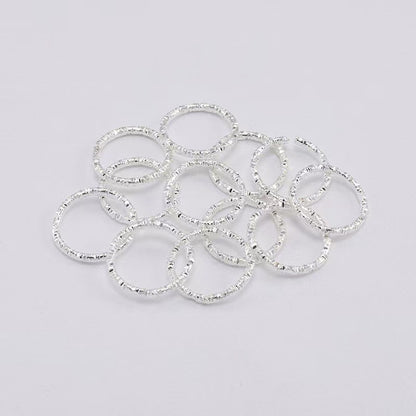 FS4011- 15mm Jump Ring Twisted Open Circle